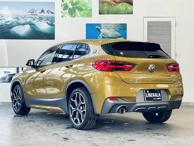 ＢＭＷ Ｘ２ sDrive18i MスポーツX 大阪府 2020(令2)年 2.1万km ガルバニックゴールドメタリック インテリジェントセーフティ/純正ナビ/バックカメラ/ハーフレザー/パワーシート/シートヒーター/Dシートメモリ/純正19インチAW/LEDヘッドライト/電動リアゲート/クリアランスソナー/ドライビングアシスト/ETC