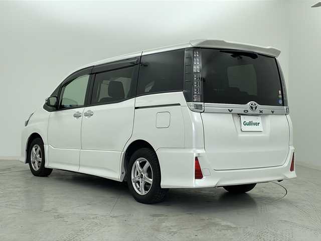 トヨタ ヴォクシー ZS 煌Ⅱ 宮城県 2017(平29)年 5.3万km ホワイトパールクリスタルシャイン 純正12型フリップダウンモニター/Toyota Safety Sense 		/・プリクラッシュセーフティ		/・レーンディパーチャーアラート		/・オートマチックハイビーム		/・先行車発進告知	/純正１０型ナビ/・SD.DVD.CD.BT/フルセグTV/バックカメラ/両側パワースライドドア/ステアリングスイッチ/革巻ステアリング/ビルトインETC2.0/ドライブレコーダー（F）/LEDヘッドライト/LEDフォグランプ/プッシュスタート/スマートキー×２/社外フロアマット/社外15inAW/ワイパーデアイサー/ロールサンシェード/横滑り防止装置/アイドリングストップ/ドアバイザー