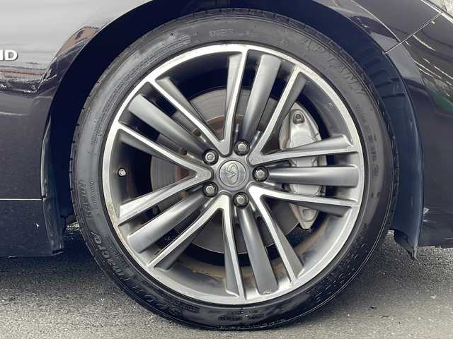 日産 スカイライン ハイブリッド 350GT Type SP 茨城県 2015(平27)年 8.7万km ガーネットブラック 純正ナビ　/全方位カメラ　/サンルーフ　/ＬＥＤライト　/クリアランスソナー　/レーダークルーズコントロール　/レーンキープアシスト　/パドルシフト　/ドラレコ　/パワーシート　/オートライト　/Ｂｌｕｅｔｏｏｔｈ接続/iPod/AUX接続可能/フォグランプ/ウィンカーミラー/純正AW19インチ/スマートキー/プッシュスタート/ETCビルトイン/ワンセグTV