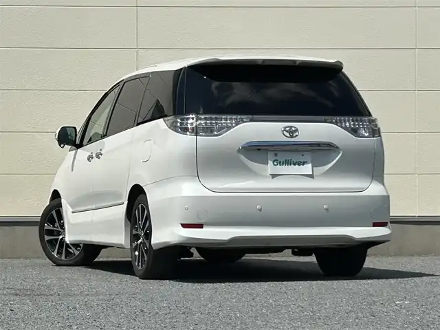 トヨタ エスティマ アエラス レザーパッケージ 茨城県 2015(平27)年 6.9万km ホワイトパールクリスタルシャイン プッシュスタート/MT付きAT/スマートキー/Wエアコン/クルーズコントロール/SDナビ（DVD再生機能あり）/フルセグTV/ビルトインETC/carrozzeriaフリップダウンモニター/格納式サードシート/D席パワーシート/純正フロアマット/両側パワースライドドア/純正アルミホイル/前後クリアランスソナー/オートライト/Wエアバック
