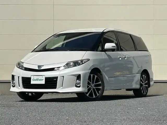 トヨタ エスティマ アエラス レザーパッケージ 茨城県 2015(平27)年 6.9万km ホワイトパールクリスタルシャイン プッシュスタート/MT付きAT/スマートキー/Wエアコン/クルーズコントロール/SDナビ（DVD再生機能あり）/フルセグTV/ビルトインETC/carrozzeriaフリップダウンモニター/格納式サードシート/D席パワーシート/純正フロアマット/両側パワースライドドア/純正アルミホイル/前後クリアランスソナー/オートライト/Wエアバック