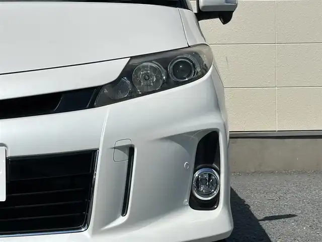 トヨタ エスティマ アエラス レザーパッケージ 茨城県 2015(平27)年 6.9万km ホワイトパールクリスタルシャイン プッシュスタート/MT付きAT/スマートキー/Wエアコン/クルーズコントロール/SDナビ（DVD再生機能あり）/フルセグTV/ビルトインETC/carrozzeriaフリップダウンモニター/格納式サードシート/D席パワーシート/純正フロアマット/両側パワースライドドア/純正アルミホイル/前後クリアランスソナー/オートライト/Wエアバック