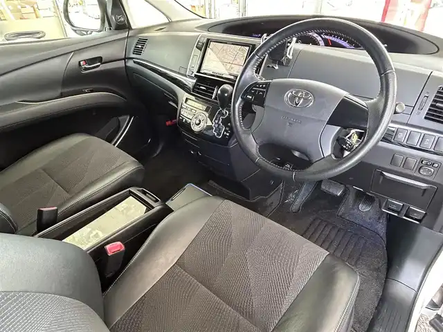 トヨタ エスティマ アエラス レザーパッケージ 茨城県 2015(平27)年 6.9万km ホワイトパールクリスタルシャイン プッシュスタート/MT付きAT/スマートキー/Wエアコン/クルーズコントロール/SDナビ（DVD再生機能あり）/フルセグTV/ビルトインETC/carrozzeriaフリップダウンモニター/格納式サードシート/D席パワーシート/純正フロアマット/両側パワースライドドア/純正アルミホイル/前後クリアランスソナー/オートライト/Wエアバック