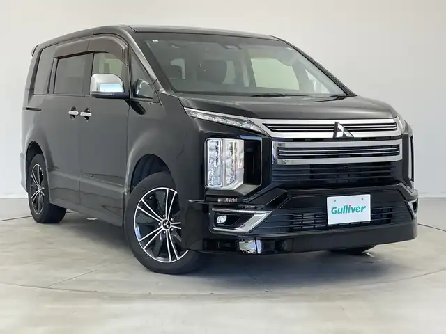 三菱 デリカＤ：５ アーバンギア G パワーパッケージ 新潟県 2019(平31)年 5.1万km ダイヤモンドブラックマイカ 4WD/10.1インチ純正メモリナビ/　フルセグTV/Bluetooth/CD/DVD/USB/衝突被害軽減ブレーキ/レーンキープアシスト/レーダークルーズコントロール/ブラインドスポットモニター/パワーバックドア/全方位モニター/ドライブレコーダー/D席パワーシート/前席シートヒーター/両側パワースライドドア/ETC/LEDヘッドライト/オートマチックハイビーム/アイドリングストップ/横滑り防止装置/オートライト/パドルシフト/レザーステアリング/ステアリングスイッチ