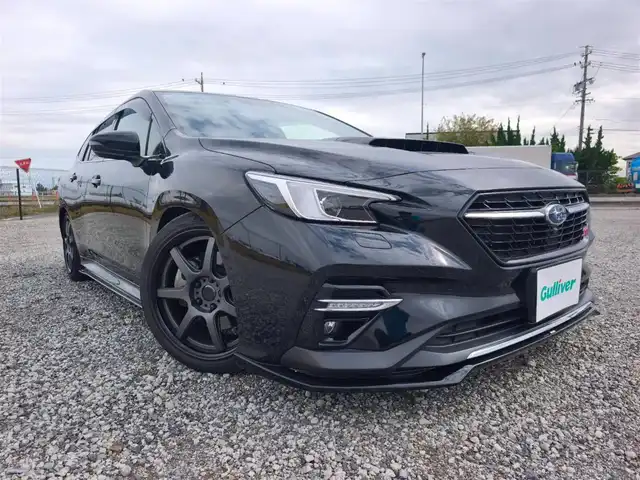 スバル レヴォーグ 1．8STIスポーツ EX 香川県 2021(令3)年 5.6万km クリスタルブラックシリカ 4WD/純正11.6型ナビ/フルセグTV/ハンズフリーパワーバックドア/バックモニター/ビルトインETC/ドライブレコーダー/全車速追従機能付クルーズコントロール/衝突被害軽減ブレーキ/前後AT誤発進抑制/車線逸脱抑制/車線変更アシスト/ドライバー異常時対応システム/デジタルルームミラー/ステアリング連動フルLEDヘッドランプ/LEDフロントフォグランプ/革巻きステアリング/パドルシフト/ツートーン革シート/全席シートヒーター/前席パワーシート/運転席ポジションメモリー機能/STIエアロ(F/S/R)/RSRサスペンション/社外18インチアルミホイール/純正サス・AW車載/スマートキー/プッシュエンジンスタート/禁煙車