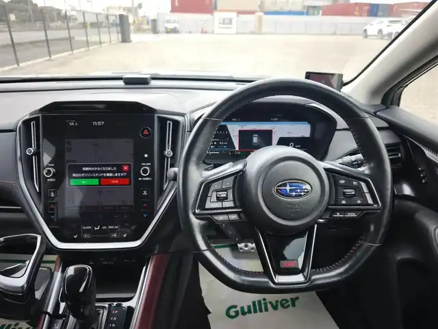 スバル レヴォーグ 1．8STIスポーツ EX 香川県 2021(令3)年 5.6万km クリスタルブラックシリカ 4WD/純正11.6型ナビ/フルセグTV/ハンズフリーパワーバックドア/バックモニター/ビルトインETC/ドライブレコーダー/全車速追従機能付クルーズコントロール/衝突被害軽減ブレーキ/前後AT誤発進抑制/車線逸脱抑制/車線変更アシスト/ドライバー異常時対応システム/デジタルルームミラー/ステアリング連動フルLEDヘッドランプ/LEDフロントフォグランプ/革巻きステアリング/パドルシフト/ツートーン革シート/全席シートヒーター/前席パワーシート/運転席ポジションメモリー機能/STIエアロ(F/S/R)/RSRサスペンション/社外18インチアルミホイール/純正サス・AW車載/スマートキー/プッシュエンジンスタート/禁煙車