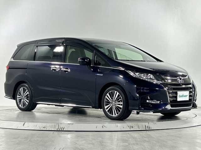 ホンダ オデッセイ ハイブリッド アブソルート・EXホンダセンジング 佐賀県 2018(平30)年 4.1万km プレミアムヴィーナスブラックP 純正9インチナビ/フルセグTV/CD/DVD/Bluetooth/純正11.6インチフリップダウンモニター/後席ヘッドレスト付きモニター/全方位カメラ/衝突被害軽減システム/レーダークルーズコントロール/レーンアシスト/ブラインドスポットモニター/パーキングソナー/先行車発進告知機能/ロードサインアシスト/オートライト/LEDヘッドライト/フォグライト/電子パーキング/ブレーキホールド/ミラー型ドライブレコーダー/ビルトインETC/両側パワースライドドア/運転席・助手席パワーシート/運転席・助手席シートヒーター/レーザーシート/ISOFIX対応シート/AC電源1500W/センターコンソールボックス/純正フロアマット/純正17インチアルミホイール/ダブルエアコン