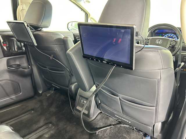 ホンダ オデッセイ ハイブリッド アブソルート・EXホンダセンジング 佐賀県 2018(平30)年 4.1万km プレミアムヴィーナスブラックP 純正9インチナビ/フルセグTV/CD/DVD/Bluetooth/純正11.6インチフリップダウンモニター/後席ヘッドレスト付きモニター/全方位カメラ/衝突被害軽減システム/レーダークルーズコントロール/レーンアシスト/ブラインドスポットモニター/パーキングソナー/先行車発進告知機能/ロードサインアシスト/オートライト/LEDヘッドライト/フォグライト/電子パーキング/ブレーキホールド/ミラー型ドライブレコーダー/ビルトインETC/両側パワースライドドア/運転席・助手席パワーシート/運転席・助手席シートヒーター/レーザーシート/ISOFIX対応シート/AC電源1500W/センターコンソールボックス/純正フロアマット/純正17インチアルミホイール/ダブルエアコン