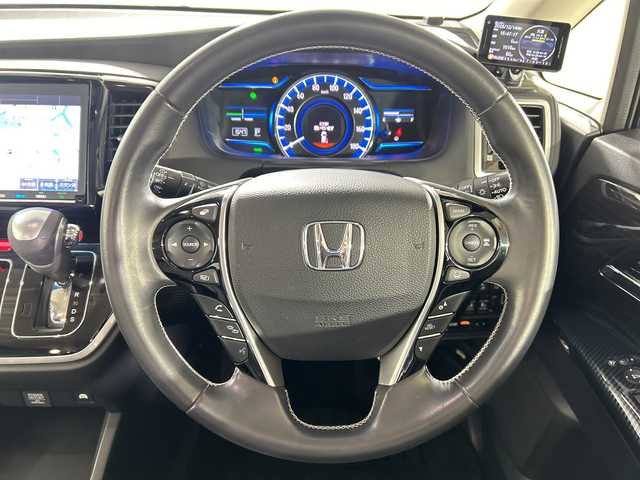 ホンダ オデッセイ ハイブリッド アブソルート・EXホンダセンジング 佐賀県 2018(平30)年 4.1万km プレミアムヴィーナスブラックP 純正9インチナビ/フルセグTV/CD/DVD/Bluetooth/純正11.6インチフリップダウンモニター/後席ヘッドレスト付きモニター/全方位カメラ/衝突被害軽減システム/レーダークルーズコントロール/レーンアシスト/ブラインドスポットモニター/パーキングソナー/先行車発進告知機能/ロードサインアシスト/オートライト/LEDヘッドライト/フォグライト/電子パーキング/ブレーキホールド/ミラー型ドライブレコーダー/ビルトインETC/両側パワースライドドア/運転席・助手席パワーシート/運転席・助手席シートヒーター/レーザーシート/ISOFIX対応シート/AC電源1500W/センターコンソールボックス/純正フロアマット/純正17インチアルミホイール/ダブルエアコン