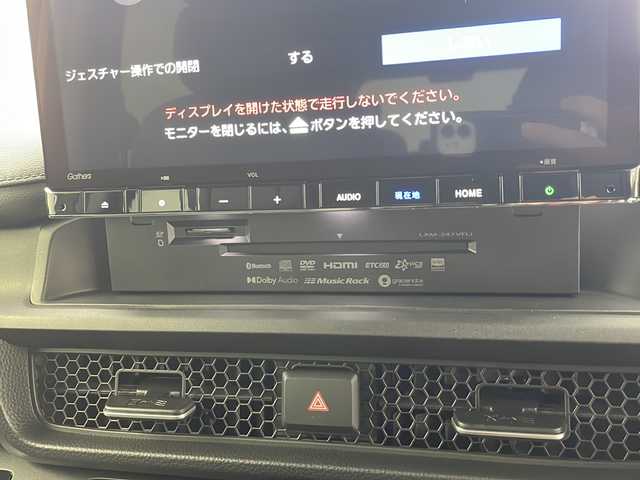 ホンダ ステップワゴン スパーダ eHEV 岐阜県 2025(令7)年 0.1万km未満 プラチナホワイトパール 登録済み未使用車・届出済み未使用車/11.4インチ純正ナビ/（BT/フルセグ/CD/DVD/USB）/ホンダセンシング/・衝突軽減ブレーキ（CMBS）/・誤発進抑制機能/・後方誤発進抑制機能/・近距離衝突軽減ブレーキ/・歩行者事故低減ステアリング/・路外逸脱抑制機能/・アダプティブクルーズコントロール（ACC）/・車線維持支援システム（LKAS）/・トラフィックジャムアシスト（渋滞運転支援機能）/・先行車発進お知らせ機能/・標識認識機能/・オートハイビーム/・アダプティブドライビングビーム/・ブラインドスポットインフォメーション/・パーキングセンサーシステム/電動リアゲート/両側パワースライドドア/オットマン/スマートキー/プッシュスタート/スペアキー/ハーフレザー/シートヒーター/革ステアリング/ステアリングスイッチ