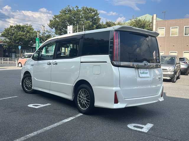 トヨタ ノア ハイブリッド Si ダブルバイビーⅡ 鳥取県 2019(平31)年 9.9万km ラグジュアリーホワイトパールクリスタルシャインガラスフレーク トヨタセーフティセンス/ワンオーナー/SDナビ(NSZT-Y68T)/CD/DVD、AM/FM、Bluetooth、USB/純正フリップダウンモニター/フルセグテレビ/バックカメラ/アイドリングストップ/クルーズコントロール/ドアバイザー/プッシュスタート/両側パワースライドドア/ビルトインETC/LEDオートライト/衝突安全装置/車線逸脱防止支援システム