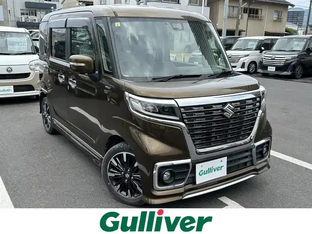 スズキ スペーシア カスタム HYBRID XS ターボ 島根県 2018(平30)年 1.9万km ブレイブカーキP ８インチ純正ＳＤナビ/フルセグTV/DVD再生/Ｂｌｕｅｔｏｏｔｈオーディオ/全方位/バック/サイドカメラ/前方ドライブレコーダー/後方コーナーセンサー/ＥＴＣ/両側パワースライドドア/クルーズコントロール/衝突被害軽減ブレーキ/横滑り防止装置/レーンキープアシスト/リアサーキュレーター/ハーフレザーシート/D席シートヒーター/アイドリングストップ/純正LEDヘッドライト/純正フロアマット/純正15インチアルミホイール
