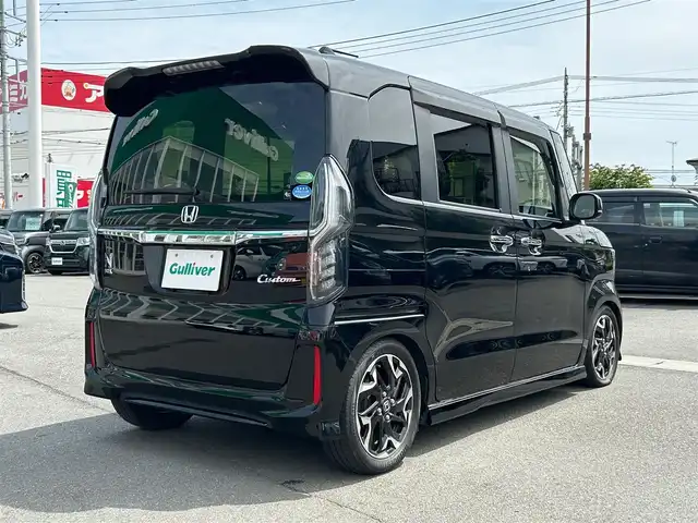 ホンダ Ｎ ＢＯＸ カスタム G L ターボ ホンダセンシング 静岡県 2018(平30)年 4.4万km クリスタルブラックパール エンジンスタートボタン/パワーステアリング/パワーウィンドウ/MTモード付AT/アイドリングストップ/スマートキー/AAC/クルーズコントロール（追従走行：有）/バックカメラ/USB入力端子/純正ETC/純正SDナビ（フルセグTV、BT接続、CDチェンジャー）/ベンチシート/純正フロアマット/ハーフレザー/両側パワースライドドア/純正アルミホイール/ABS/横滑り防止装置/レーンキープアシスト/オートライト/オートマチックハイビーム/後ろのみコーナーセンサー/LEDヘッドライト/W+サイドエアバック/衝突軽減システム