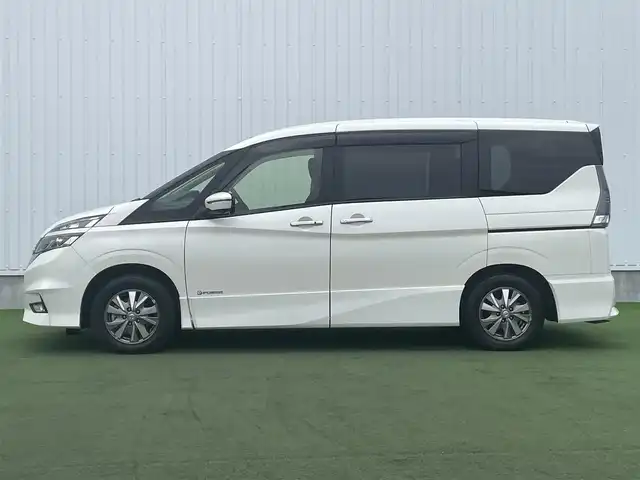 日産 セレナ e－パワー ハイウェイスター V 香川県 2019(平31)年 3.8万km ブリリアントホワイトパール 登録時走行距離：37659km/ディーラー純正9型ナビ/　フルセグTV/フリップダウンモニター/両側パワースライドドア/エマージェンシーブレーキ/レーダークルーズコントロール/レーンキープアシスト/クリアランスソナー/横滑り防止装置/LEDヘッドライト/オートライト/フォグランプ/ビルトインETC/ドライブレコーダー/ロールサンシェード/シートヒーター/ISOFIX/革巻きステアリング/ステアリングスイッチ/ステアリングヒーター/プッシュスタート/スマートキー/スペアキー