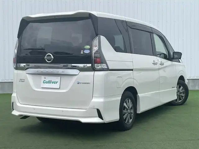 日産 セレナ e－パワー ハイウェイスター V 香川県 2019(平31)年 3.8万km ブリリアントホワイトパール 登録時走行距離：37659km/ディーラー純正9型ナビ/　フルセグTV/フリップダウンモニター/両側パワースライドドア/エマージェンシーブレーキ/レーダークルーズコントロール/レーンキープアシスト/クリアランスソナー/横滑り防止装置/LEDヘッドライト/オートライト/フォグランプ/ビルトインETC/ドライブレコーダー/ロールサンシェード/シートヒーター/ISOFIX/革巻きステアリング/ステアリングスイッチ/ステアリングヒーター/プッシュスタート/スマートキー/スペアキー