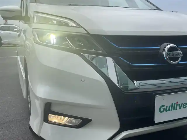 日産 セレナ e－パワー ハイウェイスター V 香川県 2019(平31)年 3.8万km ブリリアントホワイトパール 登録時走行距離：37659km/ディーラー純正9型ナビ/　フルセグTV/フリップダウンモニター/両側パワースライドドア/エマージェンシーブレーキ/レーダークルーズコントロール/レーンキープアシスト/クリアランスソナー/横滑り防止装置/LEDヘッドライト/オートライト/フォグランプ/ビルトインETC/ドライブレコーダー/ロールサンシェード/シートヒーター/ISOFIX/革巻きステアリング/ステアリングスイッチ/ステアリングヒーター/プッシュスタート/スマートキー/スペアキー