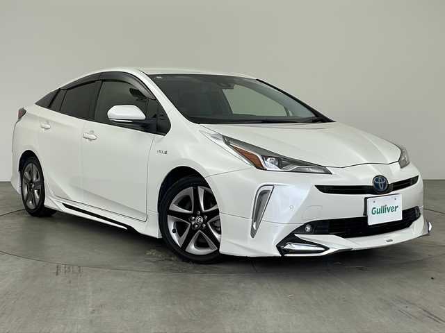 トヨタ プリウス S ツーリングセレクション 兵庫県 2019(平31)年 6.5万km ホワイトパールクリスタルシャイン ・ワンオーナー車/・純正9インチナビ&TV&CD&DVD&SD&BT&HDMI/・バックカメラ/・ビルトインETC/・革シート/・社外レーダー/・社外ドライブレコーダー/・モデリスタエアロ/・トヨタセーフティセンス/・プリクラッシュセーフティ/・レーンディパーチャーアラート/・クリアランスソナー/・オートマチックハイビーム/・クルーズコントロール/・スマートキー/・LEDライト＆LEDフォグ/・モデリスタデイライト/・TVキャンセラー/・プッシュスタート
