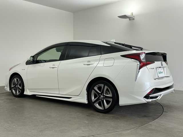 トヨタ プリウス S ツーリングセレクション 兵庫県 2019(平31)年 6.5万km ホワイトパールクリスタルシャイン ・ワンオーナー車/・純正9インチナビ&TV&CD&DVD&SD&BT&HDMI/・バックカメラ/・ビルトインETC/・革シート/・社外レーダー/・社外ドライブレコーダー/・モデリスタエアロ/・トヨタセーフティセンス/・プリクラッシュセーフティ/・レーンディパーチャーアラート/・クリアランスソナー/・オートマチックハイビーム/・クルーズコントロール/・スマートキー/・LEDライト＆LEDフォグ/・モデリスタデイライト/・TVキャンセラー/・プッシュスタート