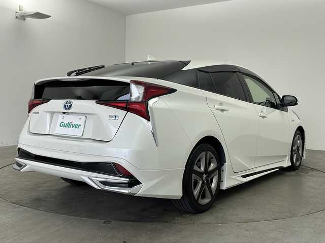 トヨタ プリウス S ツーリングセレクション 兵庫県 2019(平31)年 6.5万km ホワイトパールクリスタルシャイン ・ワンオーナー車/・純正9インチナビ&TV&CD&DVD&SD&BT&HDMI/・バックカメラ/・ビルトインETC/・革シート/・社外レーダー/・社外ドライブレコーダー/・モデリスタエアロ/・トヨタセーフティセンス/・プリクラッシュセーフティ/・レーンディパーチャーアラート/・クリアランスソナー/・オートマチックハイビーム/・クルーズコントロール/・スマートキー/・LEDライト＆LEDフォグ/・モデリスタデイライト/・TVキャンセラー/・プッシュスタート