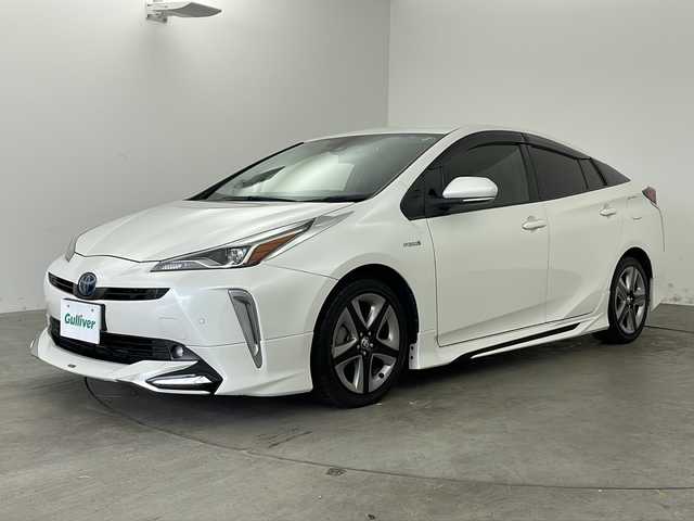トヨタ プリウス S ツーリングセレクション 兵庫県 2019(平31)年 6.5万km ホワイトパールクリスタルシャイン ・ワンオーナー車/・純正9インチナビ&TV&CD&DVD&SD&BT&HDMI/・バックカメラ/・ビルトインETC/・革シート/・社外レーダー/・社外ドライブレコーダー/・モデリスタエアロ/・トヨタセーフティセンス/・プリクラッシュセーフティ/・レーンディパーチャーアラート/・クリアランスソナー/・オートマチックハイビーム/・クルーズコントロール/・スマートキー/・LEDライト＆LEDフォグ/・モデリスタデイライト/・TVキャンセラー/・プッシュスタート