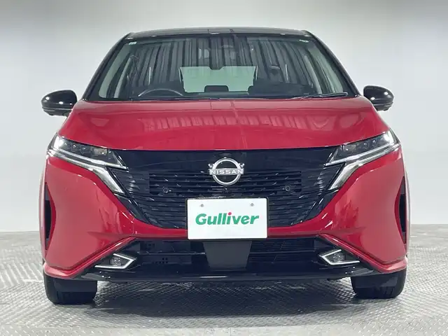 日産 オーラ G レザーエディション 神奈川県 2021(令3)年 1.4万km ガーネットレッド/スーパーブラック 2トーン 9型メーカーオプションナビゲーション/AM FM Bluetooth フルセグ HDMI AppleCarPlay/アラウンドビューモニター/BOSEプレミアムサウンド/ビークルダイナミクスコントロール/ハンドル支援/プロパイロット/車線逸脱警報/車線逸脱防止支援/後側方車両検知警報/後側方衝突防止支援/エマージェンシーブレーキ/速度標識表示/標識検知支援/駐車支援/ふらつき警報/デジタルインナーミラー/レザーシート/前席シートヒーター/ステアリングヒーター/ステアリングリモコン/ビルトインETC2.0/オートホールド/純正フロアマット/インテリジェントキー/スペアキー/LEDヘッドライト/オートライト/オートマチックハイビーム/純正17インチアルミホイル