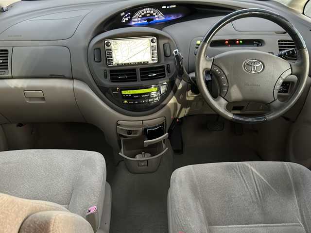 トヨタ エスティマ ハイブリッド Gセレクション 山梨県 2004(平16)年 18.1万km ホワイトパールマイカ 純正ナビ/バックカメラ/両側スライドドア/リモコンキー/クルーズコントロール/ETC/純正15インチAW/オートライト/ライトレベライザー