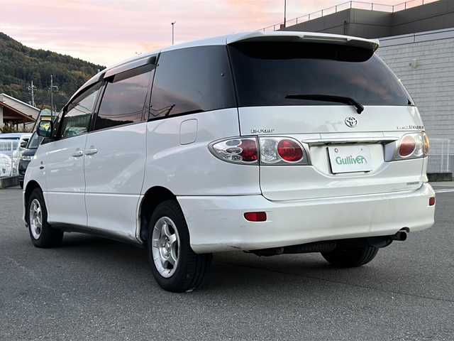 トヨタ エスティマ ハイブリッド Gセレクション 山梨県 2004(平16)年 18.1万km ホワイトパールマイカ 純正ナビ/バックカメラ/両側スライドドア/リモコンキー/クルーズコントロール/ETC/純正15インチAW/オートライト/ライトレベライザー
