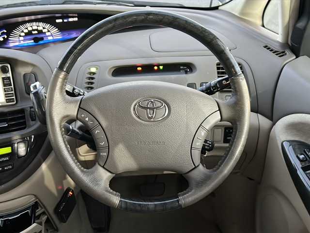 トヨタ エスティマ ハイブリッド Gセレクション 山梨県 2004(平16)年 18.1万km ホワイトパールマイカ 純正ナビ/バックカメラ/両側スライドドア/リモコンキー/クルーズコントロール/ETC/純正15インチAW/オートライト/ライトレベライザー