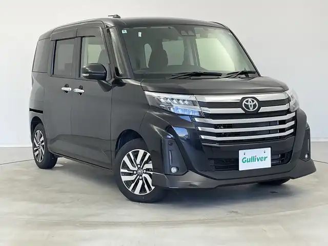 トヨタ ルーミー カスタムG 新潟県 2024(令6)年 1万km ブラックマイカメタリック 純正メモリナビ【NMZK-W73D】/　フルセグTV/Bluetooth/CD/DVD/USB/スマートアシスト/・衝突回避支援ブレーキ機能/・衝突警報機能/・ブレーキ制御付き誤発進抑制機能(前方・後方)/・車線逸脱警報機能/・ふらつき警報機能/・オートハイビーム/・全車速追従機能付アダプティブクルーズコントロール/・先行車発進お知らせ機能/・標識認識機能/両側パワースライドドア/前後コーナーセンサー/前後ドライブレコーダー/バックモニター/ビルトインETC/LEDヘッドライト/アイドリングストップ/横滑り防止装置/ステアリングスイッチ
