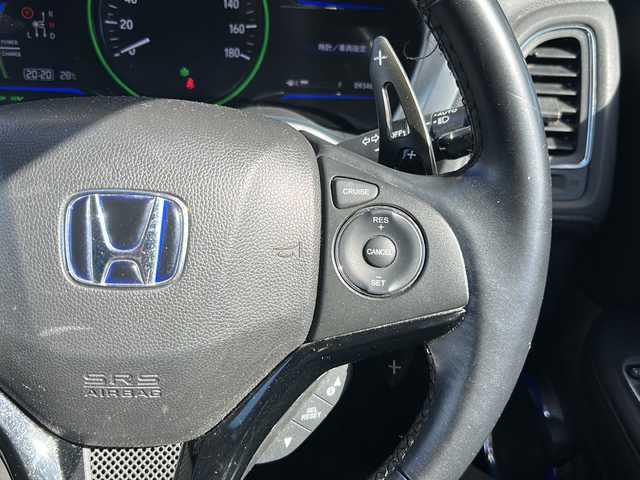ホンダ ヴェゼル ハイブリッド X 静岡県 2014(平26)年 9.4万km ホワイトオーキッドパール 社外SDナビ/・DVD/・CD/・ワンセグTV/・USB/・iPod/・AM/・FM/・VTR/プリクラッシュ/・バックカメラ/・パドルシフト/・クルーズコントロール/・ステアリングリモコン/・横滑り防止/・純正アルミホイール/・純正フロアマット/・シートカバー/・オートライト/・LEDヘッドライト/・フォグランプ/・ドアバイザー/・プッシュスタート/・スマートキー/・ETC
