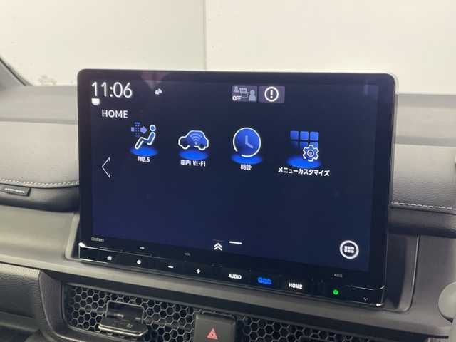 ホンダ ステップワゴン スパーダ eHEV 群馬県 2025(令7)年 0.1千km プラチナホワイトパール 純正１１．４型ナビ　アダプティブクルーズコントロール　ホンダセンシング　衝突被害軽減システム　バックカメラ　電動リアゲート　両側パワースライドドア　プッシュスタート　スマートキー　オートライト　禁煙車