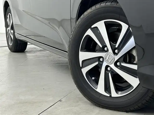 ホンダ フリード ハイブリット EX 福岡県 2017(平29)年 7万km クリスタルブラックパール 純正ナビ（フルセグＴＶ）　/バックカメラ　/前方ドラレコ　/ビルトインＥＴＣ　/ホンダセンシング　/ＡＣＣ　/衝突軽減ブレーキ　/レーンキープ　/両側電動スライドドア　/ハーフレザー　/シートヒーター　/純正１５インチＡＷ