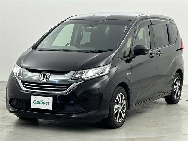 ホンダ フリード ハイブリット EX 福岡県 2017(平29)年 7万km クリスタルブラックパール 純正ナビ（フルセグＴＶ）　/バックカメラ　/前方ドラレコ　/ビルトインＥＴＣ　/ホンダセンシング　/ＡＣＣ　/衝突軽減ブレーキ　/レーンキープ　/両側電動スライドドア　/ハーフレザー　/シートヒーター　/純正１５インチＡＷ