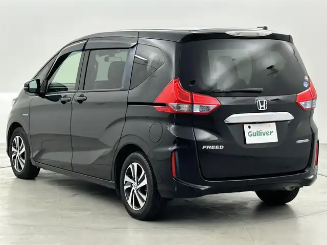 ホンダ フリード ハイブリット EX 福岡県 2017(平29)年 7万km クリスタルブラックパール 純正ナビ（フルセグＴＶ）　/バックカメラ　/前方ドラレコ　/ビルトインＥＴＣ　/ホンダセンシング　/ＡＣＣ　/衝突軽減ブレーキ　/レーンキープ　/両側電動スライドドア　/ハーフレザー　/シートヒーター　/純正１５インチＡＷ