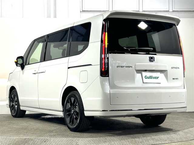 ホンダ ステップワゴン スパーダ eHEV 大阪府 2025(令7)年 0.1万km未満 プラチナホワイトパール 登録済未使用車　純正１１型ナビ（フルセグＴＶ／ＤＶＤ／ＣＤ／Ｂｌｕｅｔｏｏｔｈ）　衝突軽減　バックカメラ　両側電動ドア　ＢＳＭ　ハーフレザー　シートヒーター　電動リアゲート　レーダークルコン　ＵＳＢ