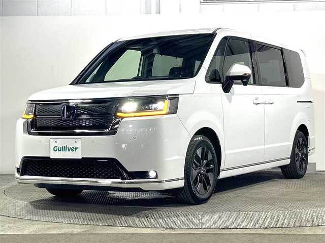 ホンダ ステップワゴン スパーダ eHEV 大阪府 2025(令7)年 0.1万km未満 プラチナホワイトパール 登録済未使用車　純正１１型ナビ（フルセグＴＶ／ＤＶＤ／ＣＤ／Ｂｌｕｅｔｏｏｔｈ）　衝突軽減　バックカメラ　両側電動ドア　ＢＳＭ　ハーフレザー　シートヒーター　電動リアゲート　レーダークルコン　ＵＳＢ