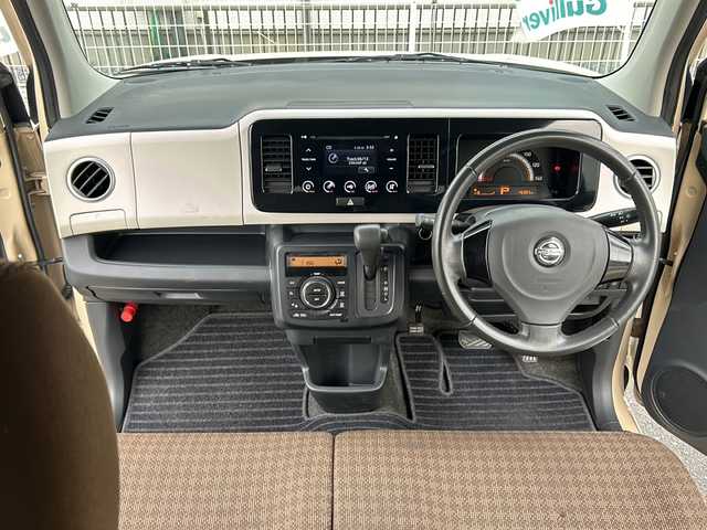 日産 モコ X 三重県 2014(平26)年 4.7万km ミルクティーベージュ 登録時46982km/純正オーディオ(AM/FM/CD/USB)/バックカメラ/アイドリングストップ/純正ホイール/電格ミラー/社外フロアマット/ドアバイザー/AAC/プッシュスタート/スマートキー