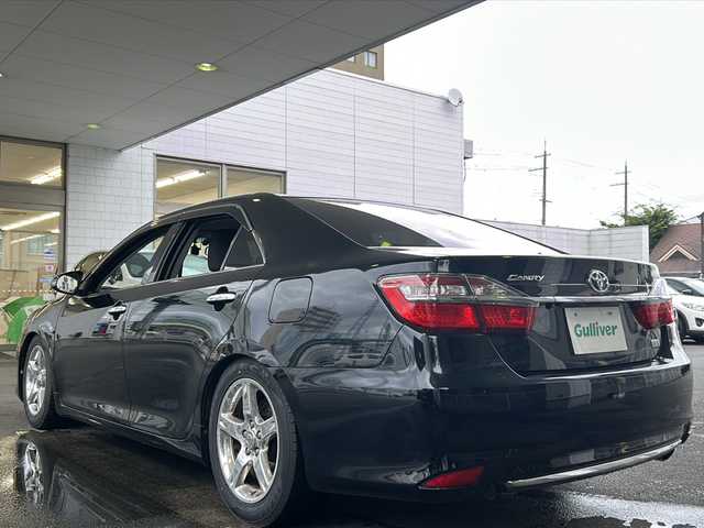 トヨタ カムリ ハイブリット Gパッケージ 京都府 2016(平28)年 10.5万km アティチュードブラックマイカ 純正ＳＤナビ　/（NSZN-W64T、7インチ）/フルセグＴＶ　/禁煙車　/バックカメラ　/Bluetooth/CD/DVD再生機能有/USB/クルーズコントロール/パワーステアリング/パワーウィンドウ　/Ｄ席パワーシート　/後席ベンチシート/スマートキー　/純正ＡＷ１７インチ/前後社外ドライブレコーダー/（CA-XDR50D)　/ウィンカーミラー/フロントフォグランプ/キセノンヘッドライト　/オートライト/電動格納ミラー　/アイドリングストップ　/デュアルエアコン/横滑り防止装置/盗難防止装置/Wサイドエアバッグ/カーテンエアバッグ/衝突被害軽減ブレーキ