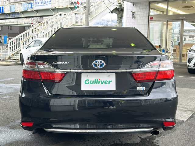 トヨタ カムリ ハイブリット Gパッケージ 京都府 2016(平28)年 10.5万km アティチュードブラックマイカ 純正ＳＤナビ　/（NSZN-W64T、7インチ）/フルセグＴＶ　/禁煙車　/バックカメラ　/Bluetooth/CD/DVD再生機能有/USB/クルーズコントロール/パワーステアリング/パワーウィンドウ　/Ｄ席パワーシート　/後席ベンチシート/スマートキー　/純正ＡＷ１７インチ/前後社外ドライブレコーダー/（CA-XDR50D)　/ウィンカーミラー/フロントフォグランプ/キセノンヘッドライト　/オートライト/電動格納ミラー　/アイドリングストップ　/デュアルエアコン/横滑り防止装置/盗難防止装置/Wサイドエアバッグ/カーテンエアバッグ/衝突被害軽減ブレーキ