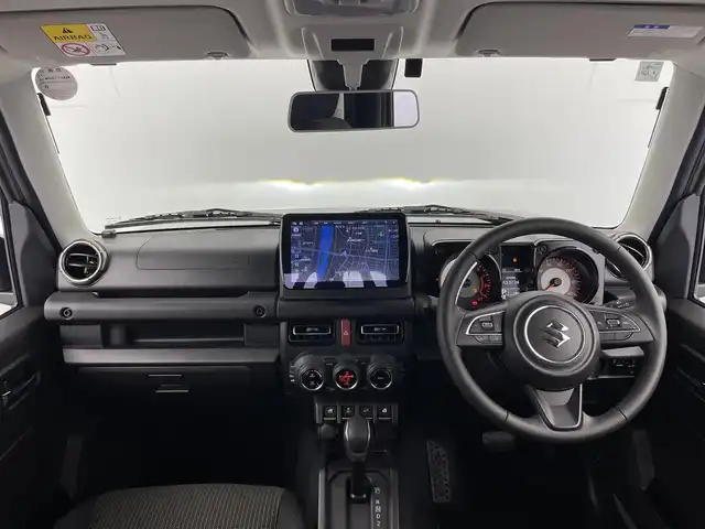 スズキ ジムニー XC 大分県 2025(令7)年 0.2万km ミディアムグレー 社外フローティングナビ/フルセグTV/Bluetooth/AM/FM/スズキセーフティーサポート/デュアルセンサーブレーキサポート/標識認識機能/車線逸脱警報機能/ふらつき警報機能/先行車発進お知らせ機能/ハイビームアシスト/クルーズコントロール/ETC/プッシュスタート/アイドリングストップ/バックカメラ/LED