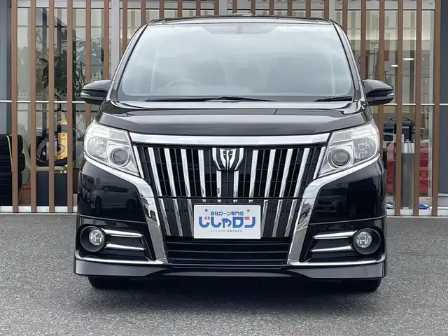 トヨタ エスクァイア Gi 鳥取県 2014(平26)年 12.2万km ブラック (株)IDOMが運営する【じしゃロン鳥取店】の自社ローン専用車両になります。こちらは現金またはオートローンご利用時の価格です。自社ローンご希望の方は別途その旨お申付け下さい/サンルーフ/純正ナビ（NSLM-W68）/・ラジオ/BT/バックカメラ/両側パワースライドドア/LEDオートライト/オートハイビーム/クルーズコントロール/ウッドコンビステアリング/ステアリングスイッチ/全席シートヒーター/専用レザーシート/ビルトインETC/スマートキー/プッシュスタート