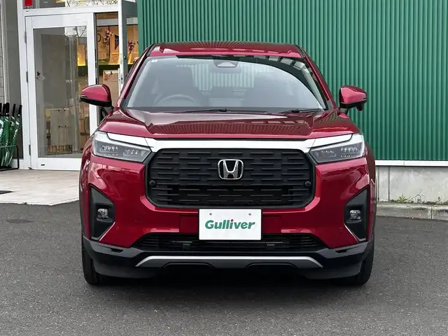 ホンダ ＷＲ－Ｖ Z 宮城県 2024(令6)年 0.4万km 赤 ホンダセンシング/●衝突軽減ブレーキ（CMBS）/●先行車発進お知らせ機能/●歩行者事故低減ステアリング/●路外逸脱抑制機能/●標識認識機能/●アダプティブクルーズコントロール（ACC）/●車線維持支援システム（LKAS）/●誤発進抑制機能/●後方誤発進抑制機能/●近距離衝突軽減ブレーキ/●急アクセル抑制機能/●パーキングセンサーシステム/●オートハイビーム/Honda CONNECTナビ/・Bluetooth/・AppleCarPlay/AndroidAuto/・フルセグTV/バックカメラ/ビルトインETC/ハーフレザーシート/革巻きステアリング/ステアリングスイッチ/パドルシフト/LEDヘッドランプ/フォグランプ/オートライト/スマートキー＆プッシュスタート/電動格納ミラー/純正17インチAW/純正フロアマット/ドアバイザー/トノカバー/W/サイド/カーテンエアバッグ
