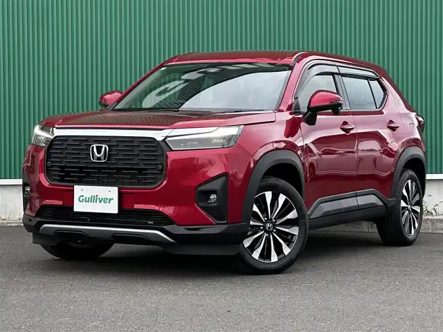 ホンダ ＷＲ－Ｖ Z 宮城県 2024(令6)年 0.4万km 赤 ホンダセンシング/●衝突軽減ブレーキ（CMBS）/●先行車発進お知らせ機能/●歩行者事故低減ステアリング/●路外逸脱抑制機能/●標識認識機能/●アダプティブクルーズコントロール（ACC）/●車線維持支援システム（LKAS）/●誤発進抑制機能/●後方誤発進抑制機能/●近距離衝突軽減ブレーキ/●急アクセル抑制機能/●パーキングセンサーシステム/●オートハイビーム/Honda CONNECTナビ/・Bluetooth/・AppleCarPlay/AndroidAuto/・フルセグTV/バックカメラ/ビルトインETC/ハーフレザーシート/革巻きステアリング/ステアリングスイッチ/パドルシフト/LEDヘッドランプ/フォグランプ/オートライト/スマートキー＆プッシュスタート/電動格納ミラー/純正17インチAW/純正フロアマット/ドアバイザー/トノカバー/W/サイド/カーテンエアバッグ