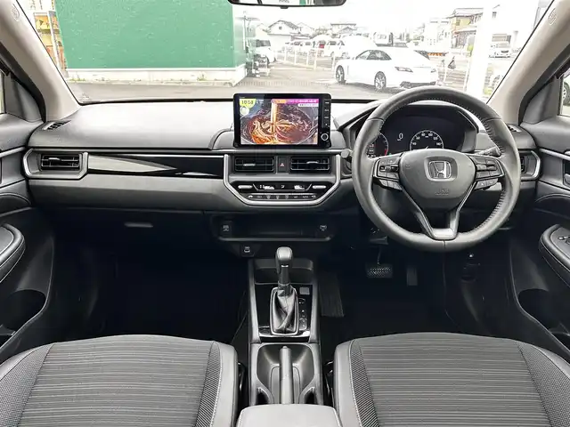 ホンダ ＷＲ－Ｖ Z 宮城県 2024(令6)年 0.4万km 赤 ホンダセンシング/●衝突軽減ブレーキ（CMBS）/●先行車発進お知らせ機能/●歩行者事故低減ステアリング/●路外逸脱抑制機能/●標識認識機能/●アダプティブクルーズコントロール（ACC）/●車線維持支援システム（LKAS）/●誤発進抑制機能/●後方誤発進抑制機能/●近距離衝突軽減ブレーキ/●急アクセル抑制機能/●パーキングセンサーシステム/●オートハイビーム/Honda CONNECTナビ/・Bluetooth/・AppleCarPlay/AndroidAuto/・フルセグTV/バックカメラ/ビルトインETC/ハーフレザーシート/革巻きステアリング/ステアリングスイッチ/パドルシフト/LEDヘッドランプ/フォグランプ/オートライト/スマートキー＆プッシュスタート/電動格納ミラー/純正17インチAW/純正フロアマット/ドアバイザー/トノカバー/W/サイド/カーテンエアバッグ