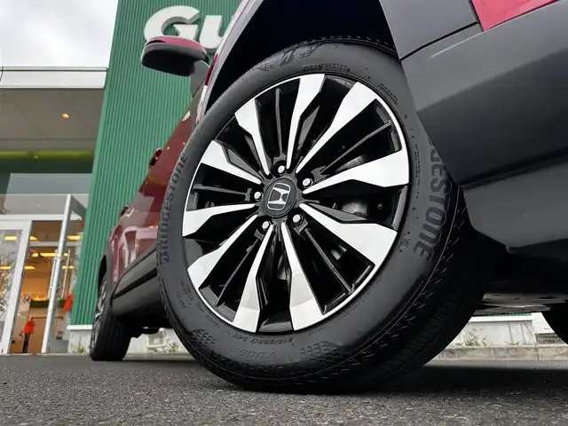 ホンダ ＷＲ－Ｖ Z 宮城県 2024(令6)年 0.4万km 赤 ホンダセンシング/●衝突軽減ブレーキ（CMBS）/●先行車発進お知らせ機能/●歩行者事故低減ステアリング/●路外逸脱抑制機能/●標識認識機能/●アダプティブクルーズコントロール（ACC）/●車線維持支援システム（LKAS）/●誤発進抑制機能/●後方誤発進抑制機能/●近距離衝突軽減ブレーキ/●急アクセル抑制機能/●パーキングセンサーシステム/●オートハイビーム/Honda CONNECTナビ/・Bluetooth/・AppleCarPlay/AndroidAuto/・フルセグTV/バックカメラ/ビルトインETC/ハーフレザーシート/革巻きステアリング/ステアリングスイッチ/パドルシフト/LEDヘッドランプ/フォグランプ/オートライト/スマートキー＆プッシュスタート/電動格納ミラー/純正17インチAW/純正フロアマット/ドアバイザー/トノカバー/W/サイド/カーテンエアバッグ