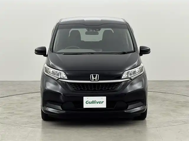 ホンダ フリード G ホンダセンシング 福岡県 2020(令2)年 4.2万km クリスタルブラックパール 純正９インチナビ　/ＥＴＣ　/バックカメラ　/両側パワースライドドア　/前後ドライブレコーダー　/前席シートヒーター　/レーダークルーズコントロール　/プリクラッシュセーフティ　/レーンキープ　/純正１５インチＡＷ