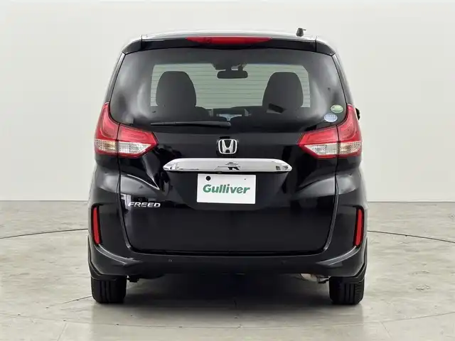 ホンダ フリード G ホンダセンシング 福岡県 2020(令2)年 4.2万km クリスタルブラックパール 純正９インチナビ　/ＥＴＣ　/バックカメラ　/両側パワースライドドア　/前後ドライブレコーダー　/前席シートヒーター　/レーダークルーズコントロール　/プリクラッシュセーフティ　/レーンキープ　/純正１５インチＡＷ