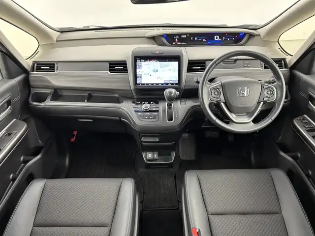 ホンダ フリード G ホンダセンシング 福岡県 2020(令2)年 4.2万km クリスタルブラックパール 純正９インチナビ　/ＥＴＣ　/バックカメラ　/両側パワースライドドア　/前後ドライブレコーダー　/前席シートヒーター　/レーダークルーズコントロール　/プリクラッシュセーフティ　/レーンキープ　/純正１５インチＡＷ