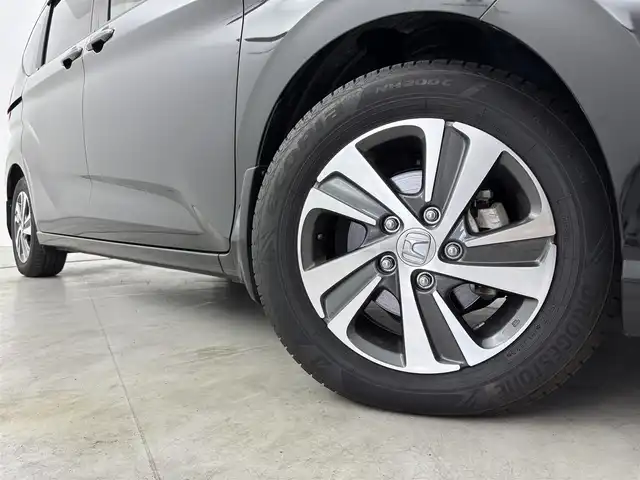 ホンダ フリード G ホンダセンシング 福岡県 2020(令2)年 4.2万km クリスタルブラックパール 純正９インチナビ　/ＥＴＣ　/バックカメラ　/両側パワースライドドア　/前後ドライブレコーダー　/前席シートヒーター　/レーダークルーズコントロール　/プリクラッシュセーフティ　/レーンキープ　/純正１５インチＡＷ