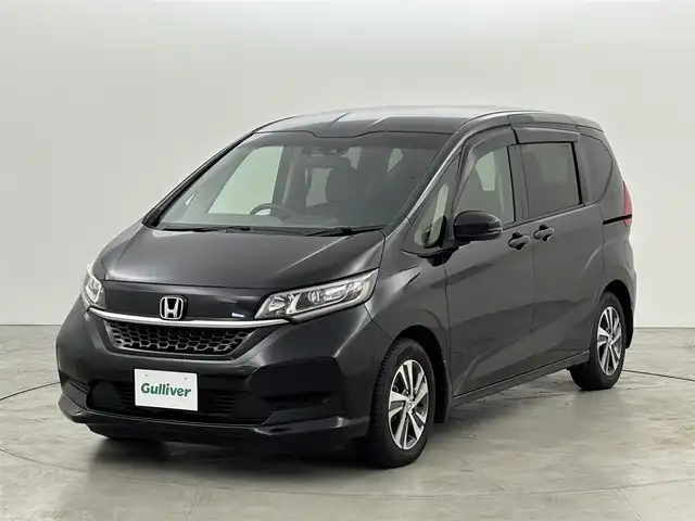 ホンダ フリード G ホンダセンシング 福岡県 2020(令2)年 4.2万km クリスタルブラックパール 純正９インチナビ　/ＥＴＣ　/バックカメラ　/両側パワースライドドア　/前後ドライブレコーダー　/前席シートヒーター　/レーダークルーズコントロール　/プリクラッシュセーフティ　/レーンキープ　/純正１５インチＡＷ